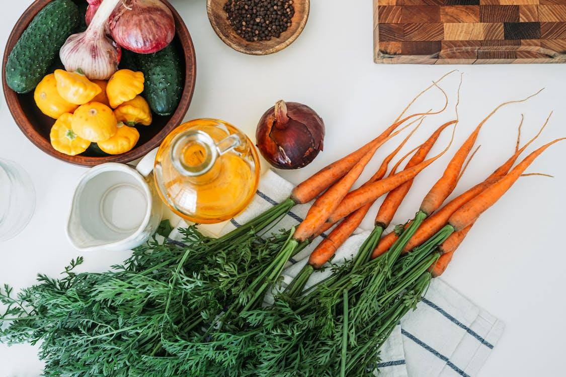 Carrot seed oil on kitchen table for skin